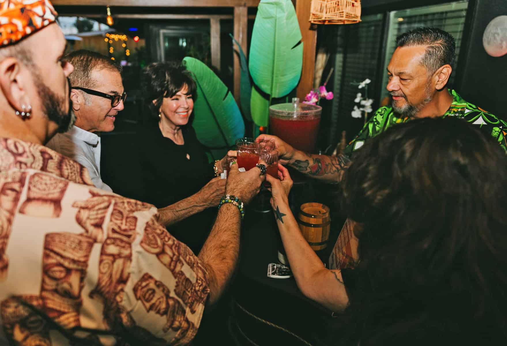 People toasting with cocktails at Cocktails and True Tales: An Oral History Happy Hour